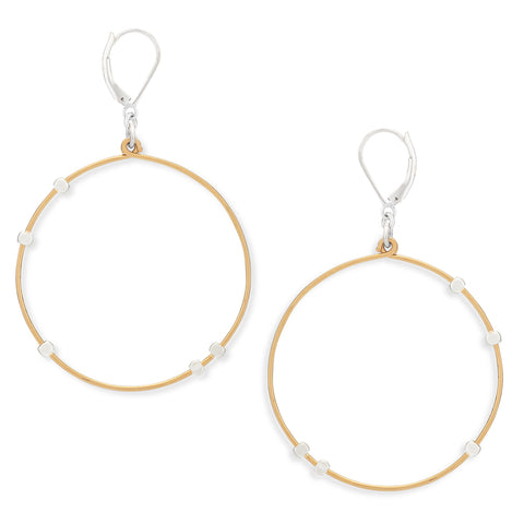 Silver cosmos earrings by Freshie & Zero featuring delicate flower-shaped design and intricate details.