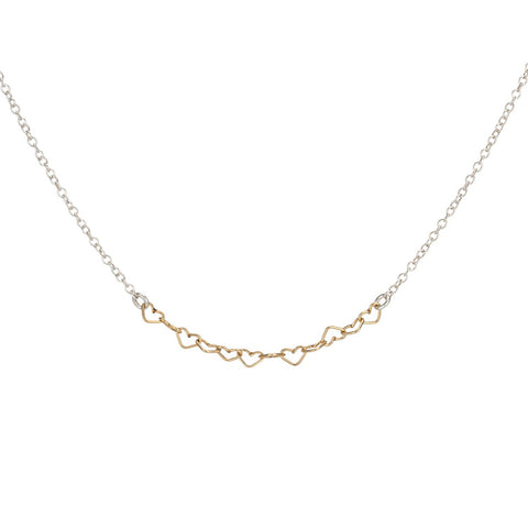 Freshie & Zero Bitsy Hearts Necklace featuring a delicate chain with small heart charms, perfect for layering or everyday wear.