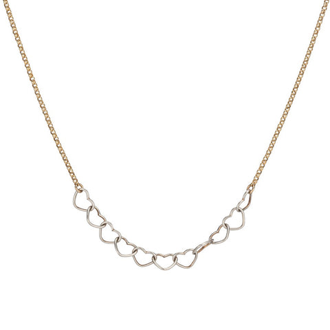Heart Garland Necklace by Freshie & Zero featuring a delicate chain with a heart-shaped pendant, perfect for layered jewelry styles.