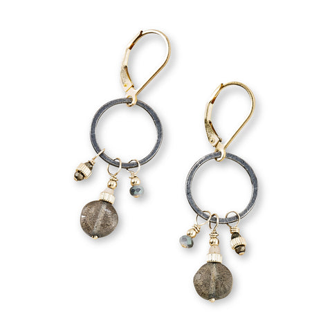 Portico Labradorite and gold dangle earrings by Freshie & Zero showcasing iridescent labradorite stones and gold hooks.