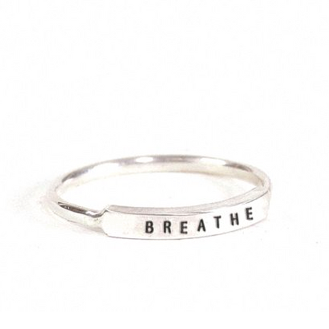 Stamped silver ring by Christina Kober featuring minimalist design and engraved details, perfect for everyday wear.
