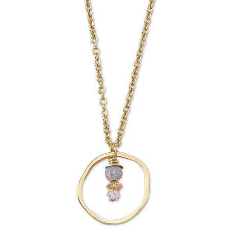 Gold circle necklace featuring a sunrise moonstone pendant from Freshie & Zero, elegant jewelry accessory.
