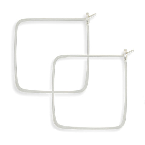 Large square minimal hoop earrings by Freshie & Zero, featuring sleek geometric design in polished metal.