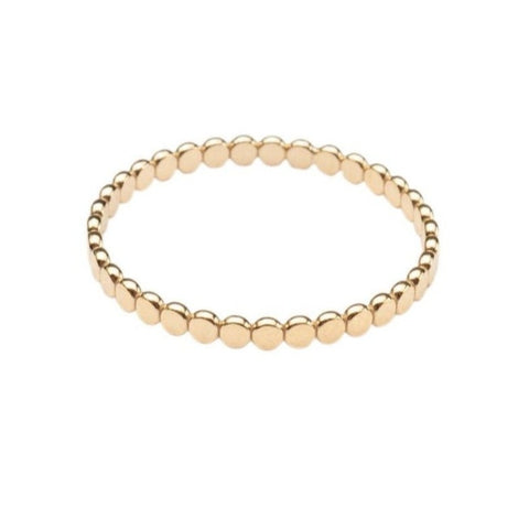 Gold filled flat beaded stacking ring with a smooth, shiny finish, perfect for layered jewelry styles.