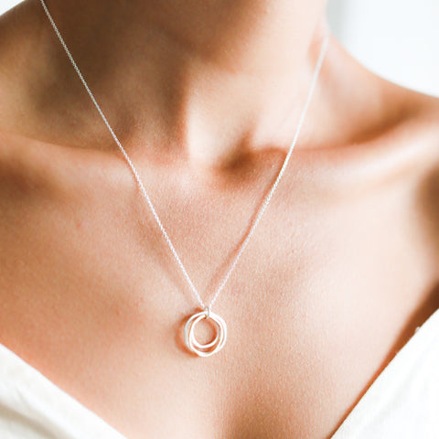 Freshie & Zero river rocks necklace featuring natural stone beads on a delicate chain, showcasing earthy tones and handcrafted style.