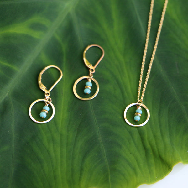 Freshie & Zero Seedling Sky Necklace with delicate pendant featuring a leafy seedling design on a fine chain.