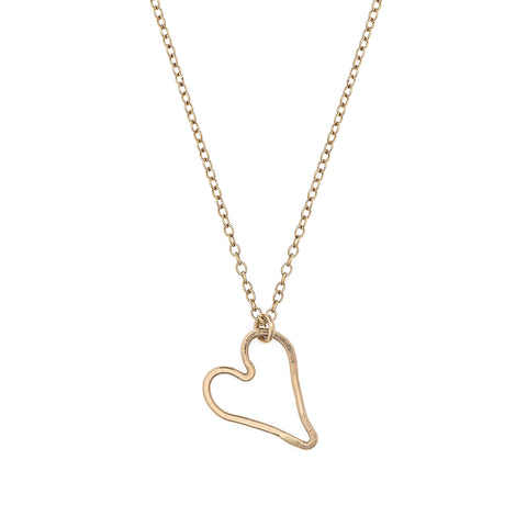 Small modern heart necklace by Freshie & Zero featuring a minimalist heart pendant on a delicate chain.