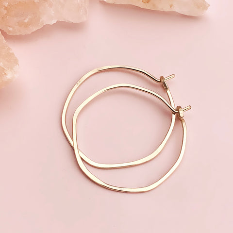 Small organic circle hoop earrings by Freshie & Zero featuring minimalist design in a natural, organic style.